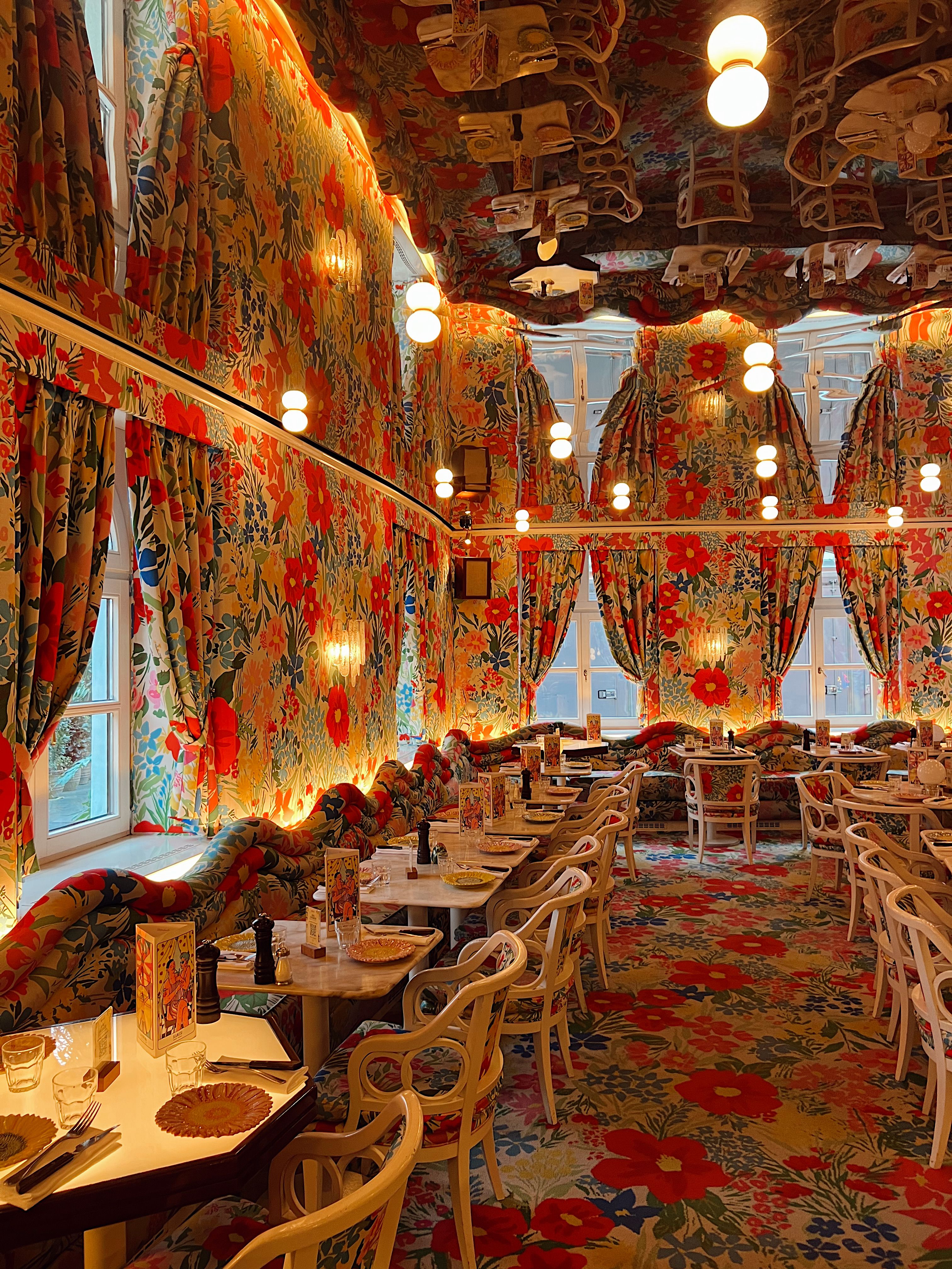 Vibrant Floral-Themed Restaurant Interior Design · Free Stock Photo