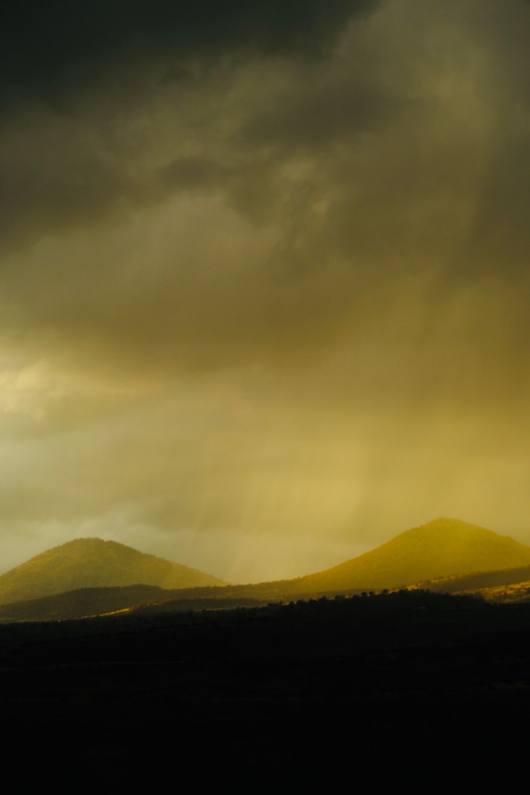 Dramatic Sunset Over Mountain Range · Free Stock Photo