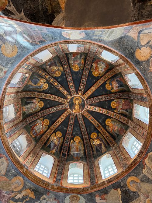 Free A beautifully painted dome ceiling featuring intricate religious artwork and symbolism. Stock Photo