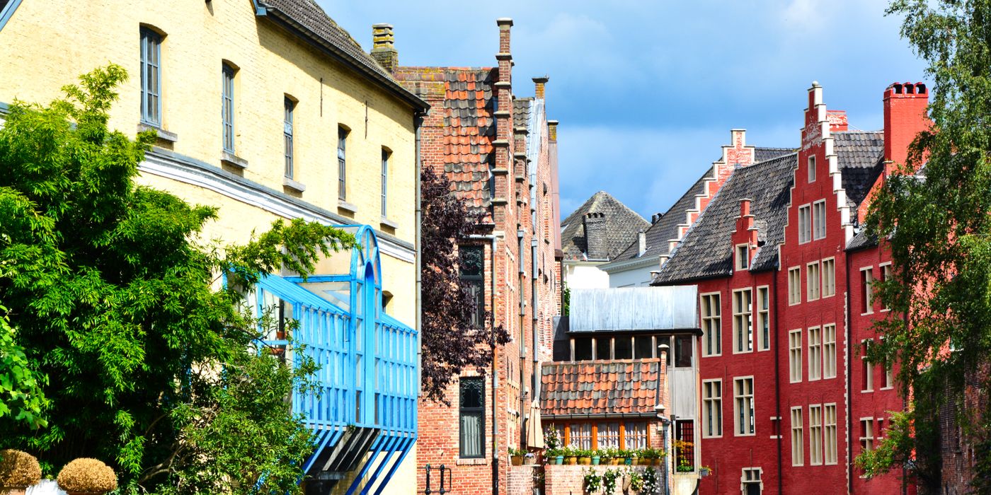 Picturesque canal view in Ghent Belgium with medieval architecture along the water