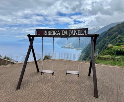 Swing set with scenic ocean and mountain view at Ribeira da Janela, Madeira.