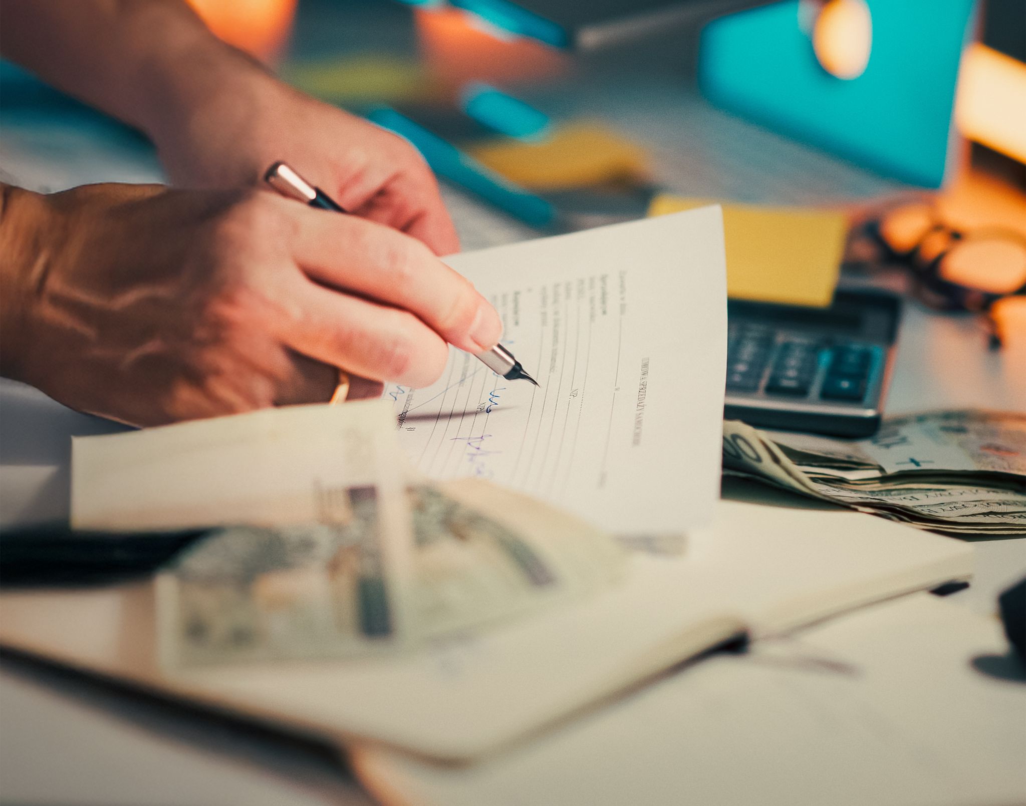 Accountant working through financial paperwork