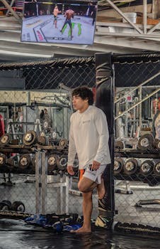 An athlete prepares for a mixed martial arts competition in a gym in San Luis Potosí.