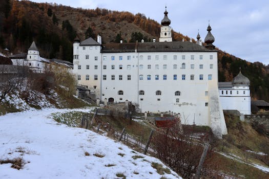 Churburg Castle in Sluderno during a snowy winter day, captured outdoors.