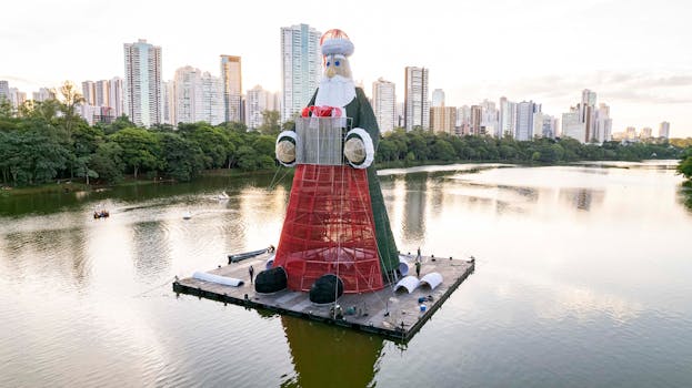 Aerial view of a giant Santa Claus sculpture on Lago Igapó in Londrina, Brazil.