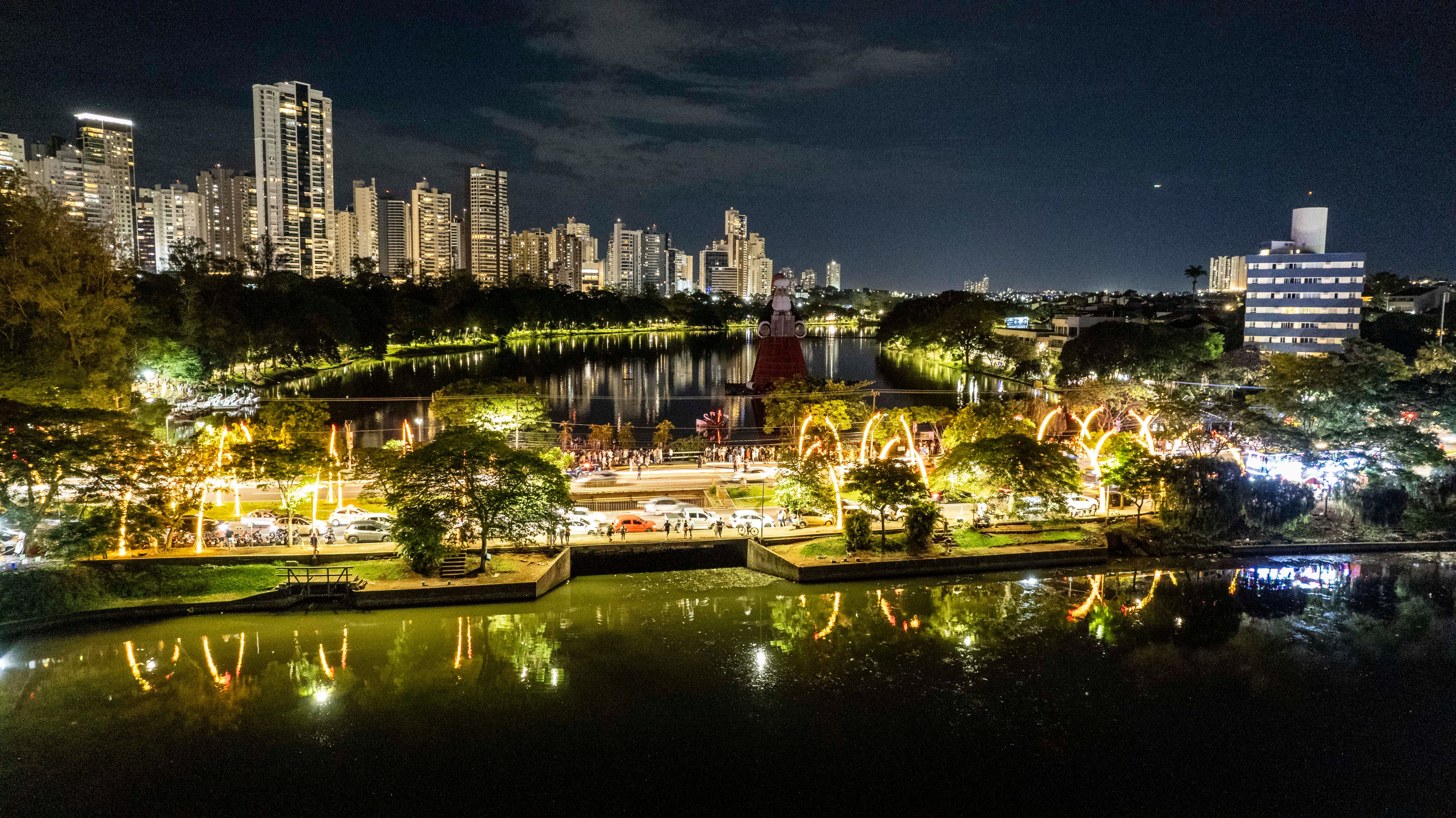 Imagem de drone sobre o Lago Igapó em Londrina, com foco em criptomoedas e tributação no Brasil.