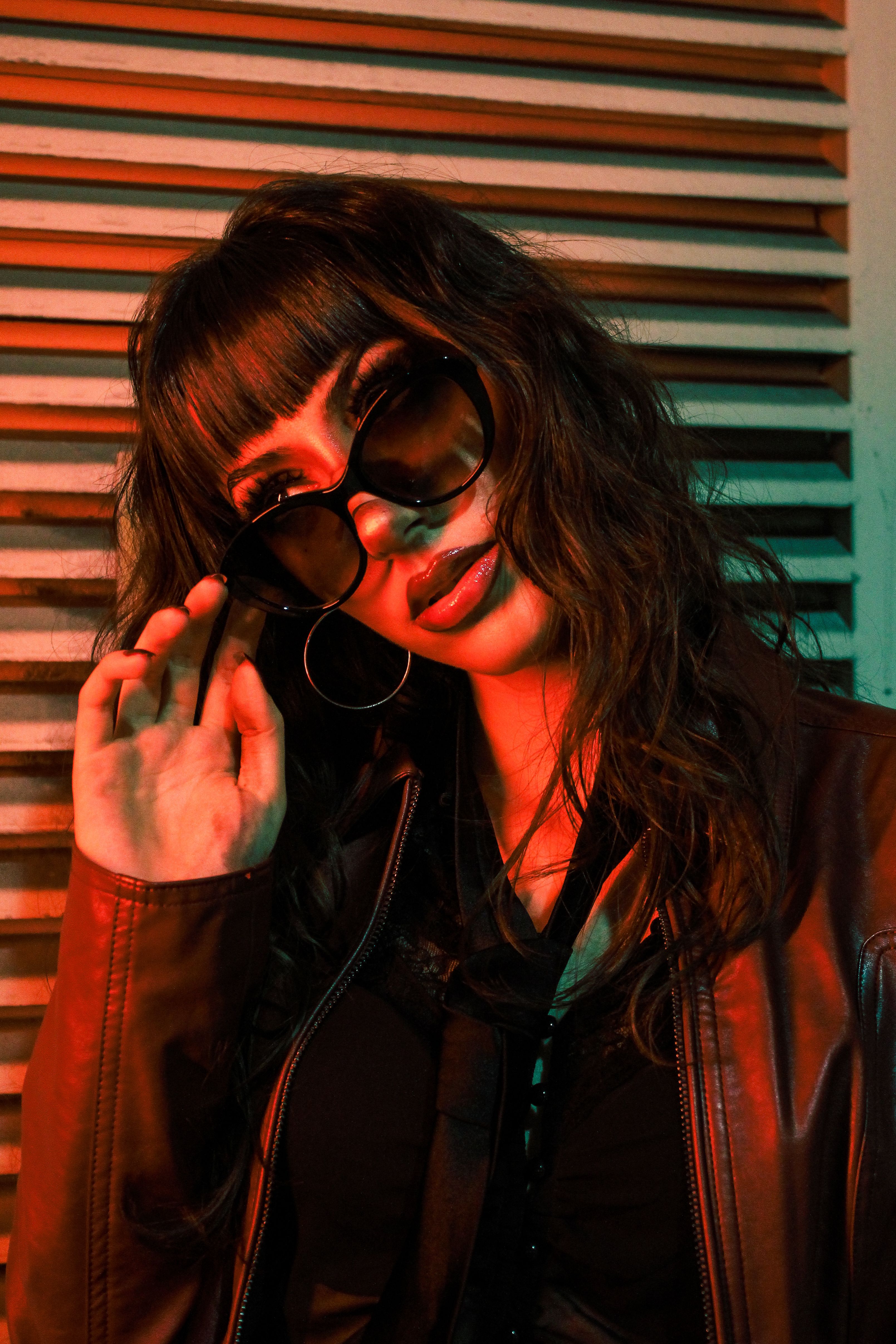 Stylish Woman in Sunglasses and Leather Jacket · Free Stock Photo