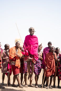 A vibrant capture of Maasai warriors performing the traditional Adumu dance in Kenya.