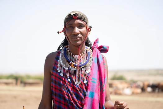 Portrait of Masai tribe member in traditional attire, showcasing cultural heritage in Kenya.