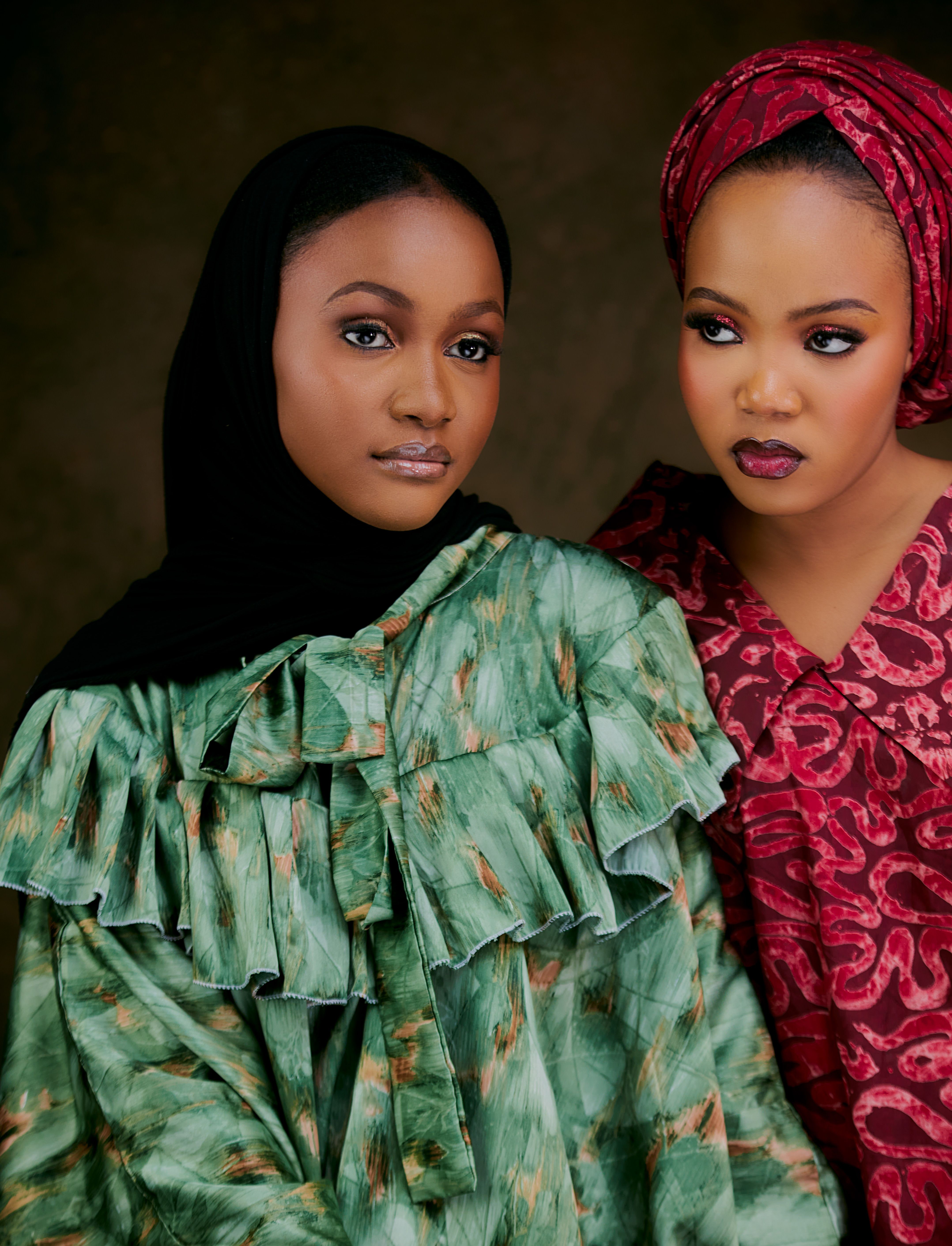 Fashion Portrait of Two Women in Traditional Attire · Free Stock Photo