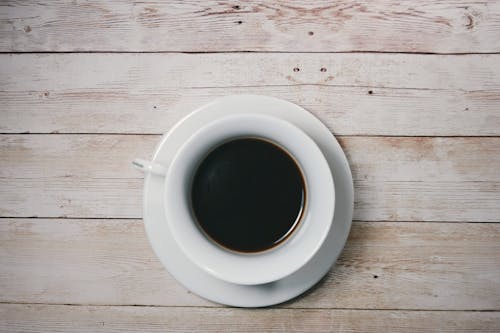 Free White Ceramic Cup With Black Liquid Inside Stock Photo