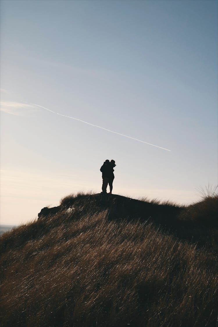 Silhouette Of Person On Mountain