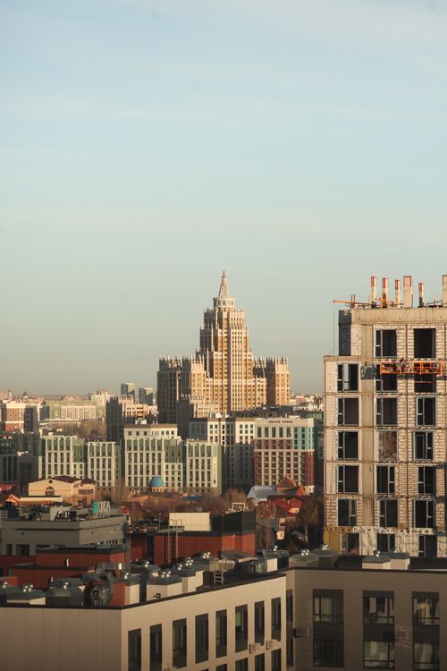 Free Stunning aerial view of a city skyline featuring distinct skyscrapers and urban architecture. Stock Photo