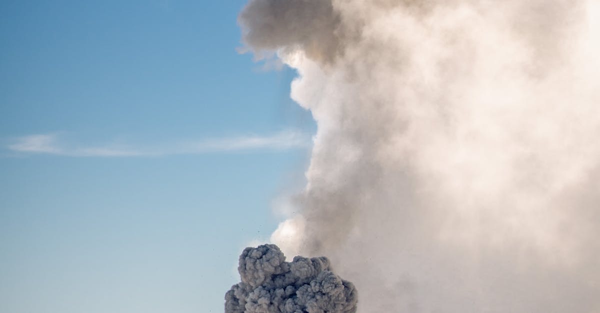 Photo by Luis Arroyave Spectacular image of an erupting volcano with a massive ash cloud reaching the sky.