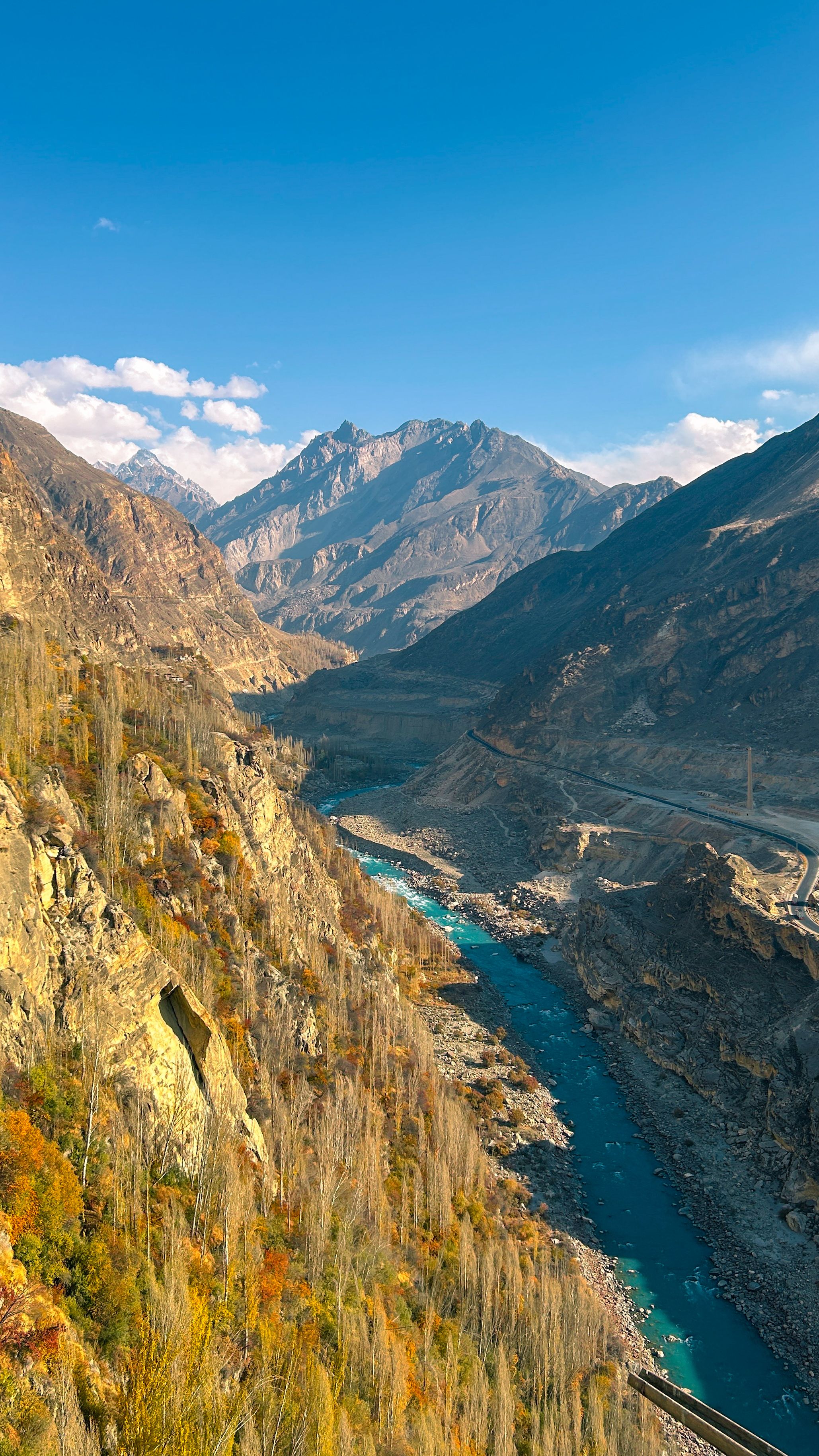 green mountains of northern Pakistan with scenic river valley
