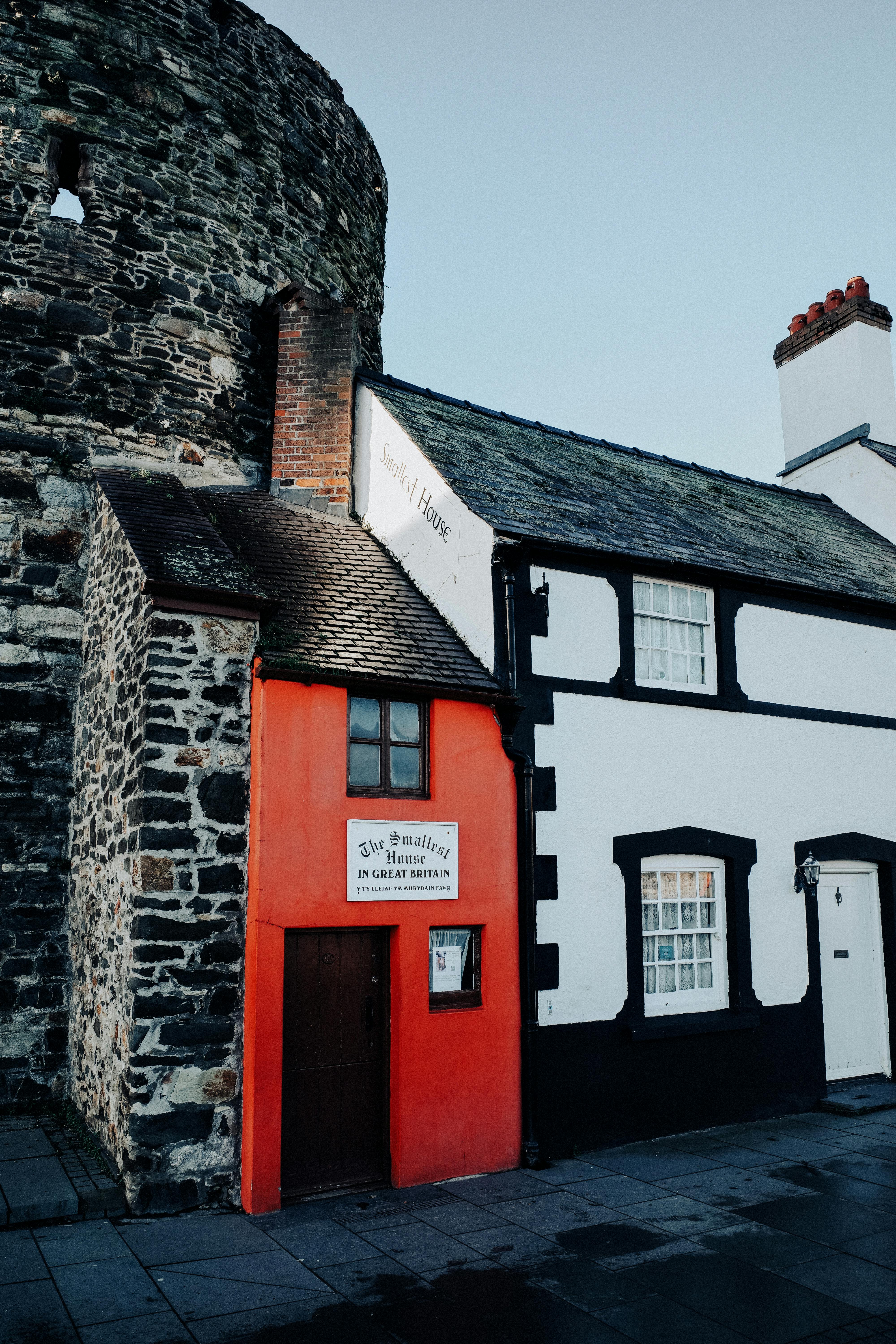 Historic British architecture featuring the Smallest House in Great Britain, nestled in Conwy, Wales.
