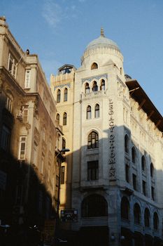 Historic architectural charm of Legacy Ottoman Hotel bathed in sunlight in Istanbul.