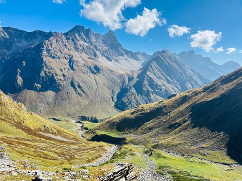 Free Spectacular view of rugged alpine mountains under a clear blue sky. Stock Photo