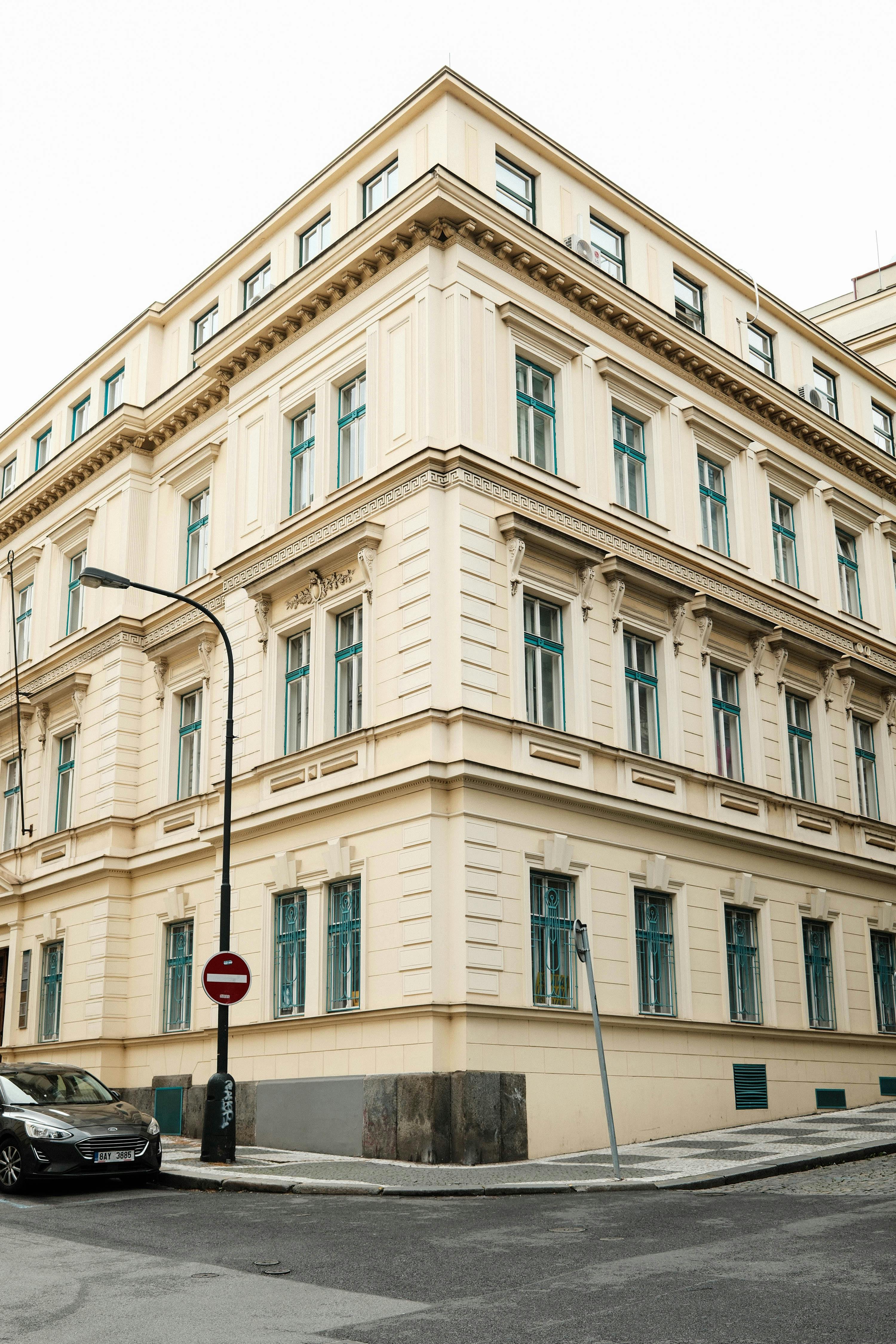 Free Corner view of a classic European building in Prague with ornate details. Stock Photo