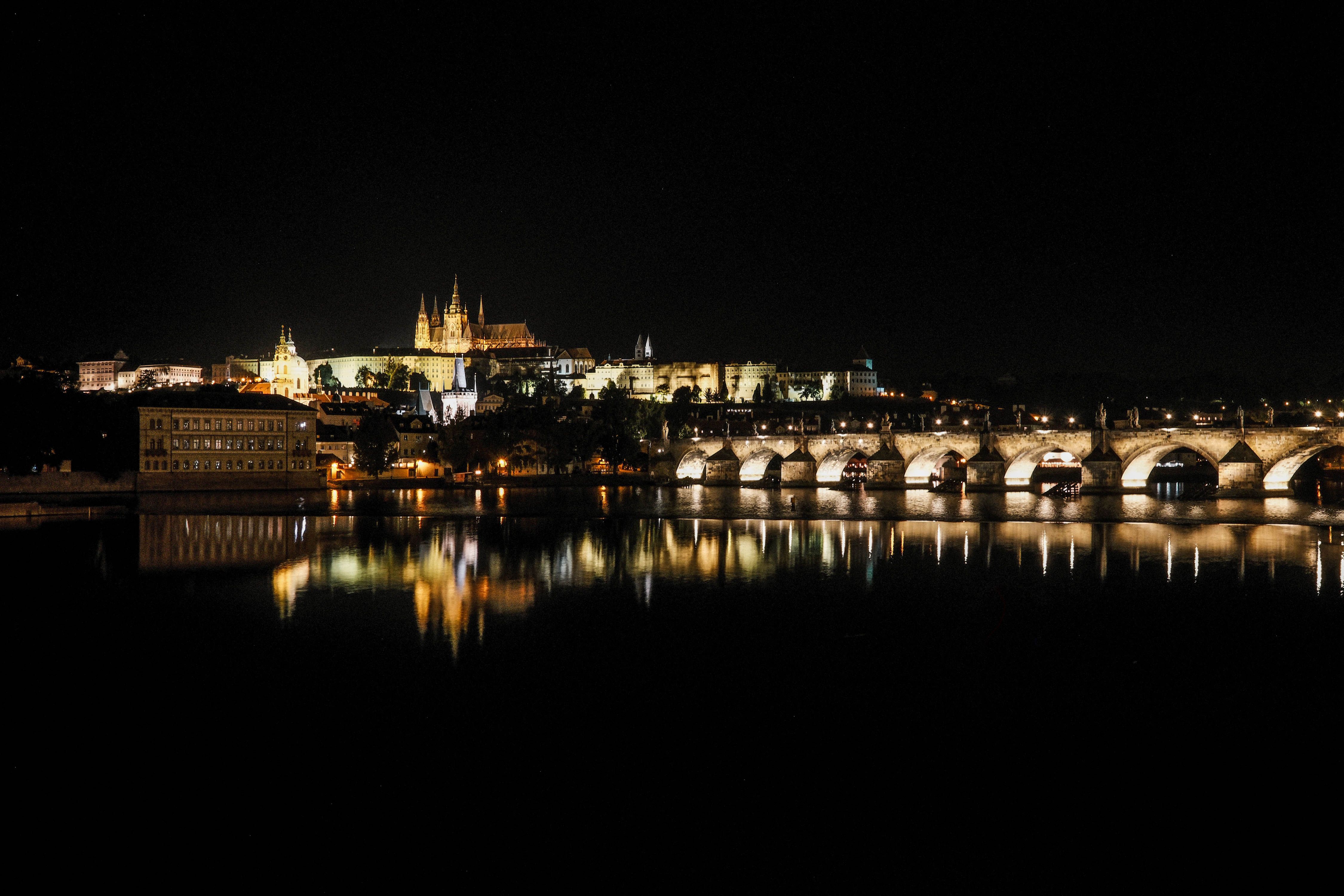 Prague illuminated at night on a Prague Travel Bucket List