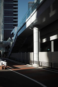 Urban architecture with strong shadows in Shibuya, Tokyo.