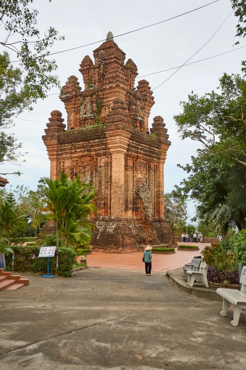 Free Experience the historic beauty of Tháp Nhạn Tower in Phú Yên, surrounded by lush vegetation. Stock Photo