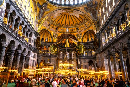 Free Stunning view of Hagia Sophia's interior showcasing rich Byzantine architecture with visitors. Stock Photo