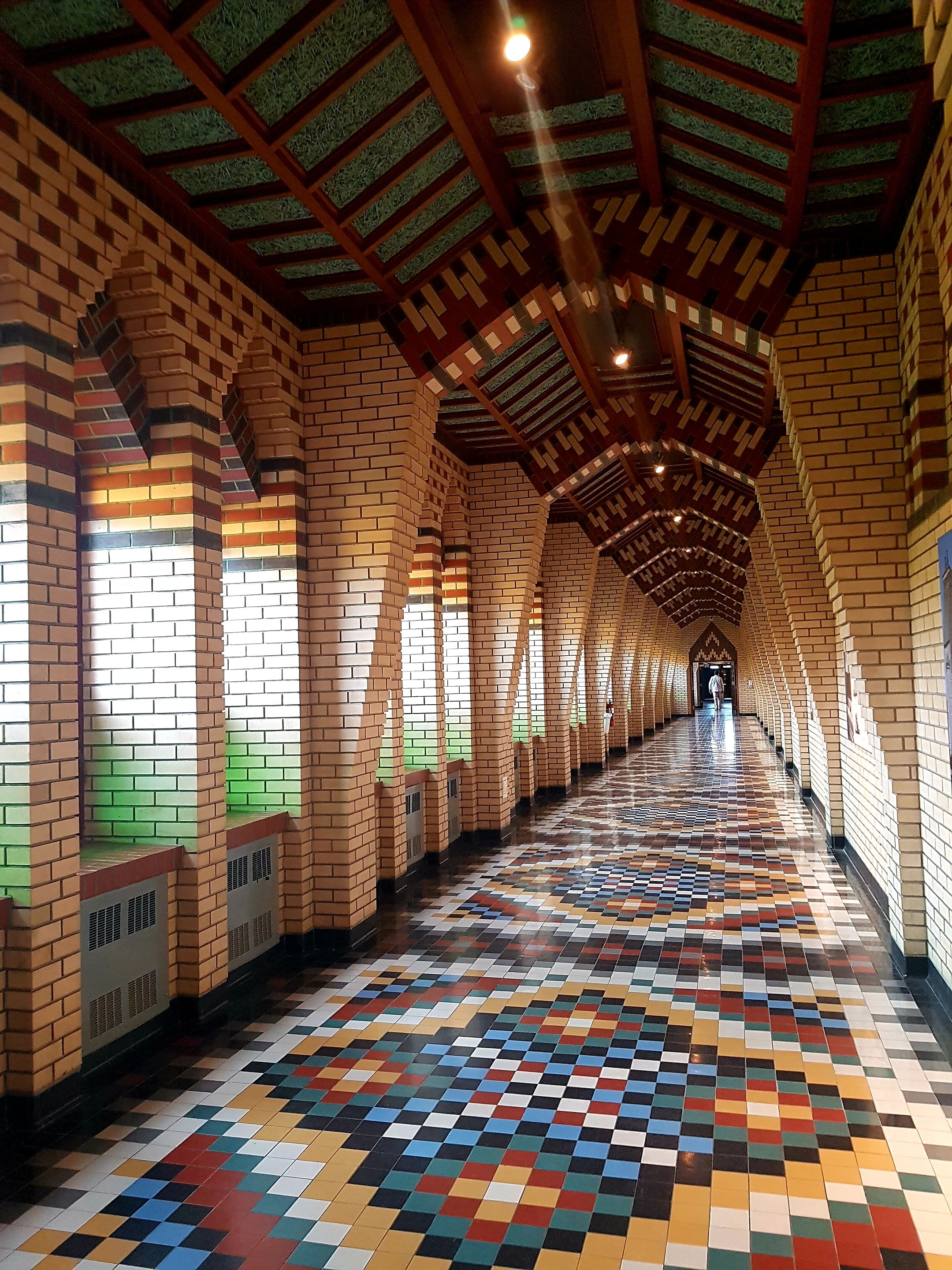 Colorful Brick Corridor with Unique Architecture · Free Stock Photo