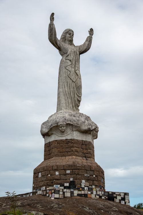 Free Majestic Christ the Redeemer statue in Laguna, Santa Catarina, Brazil against a cloudy sky. Stock Photo