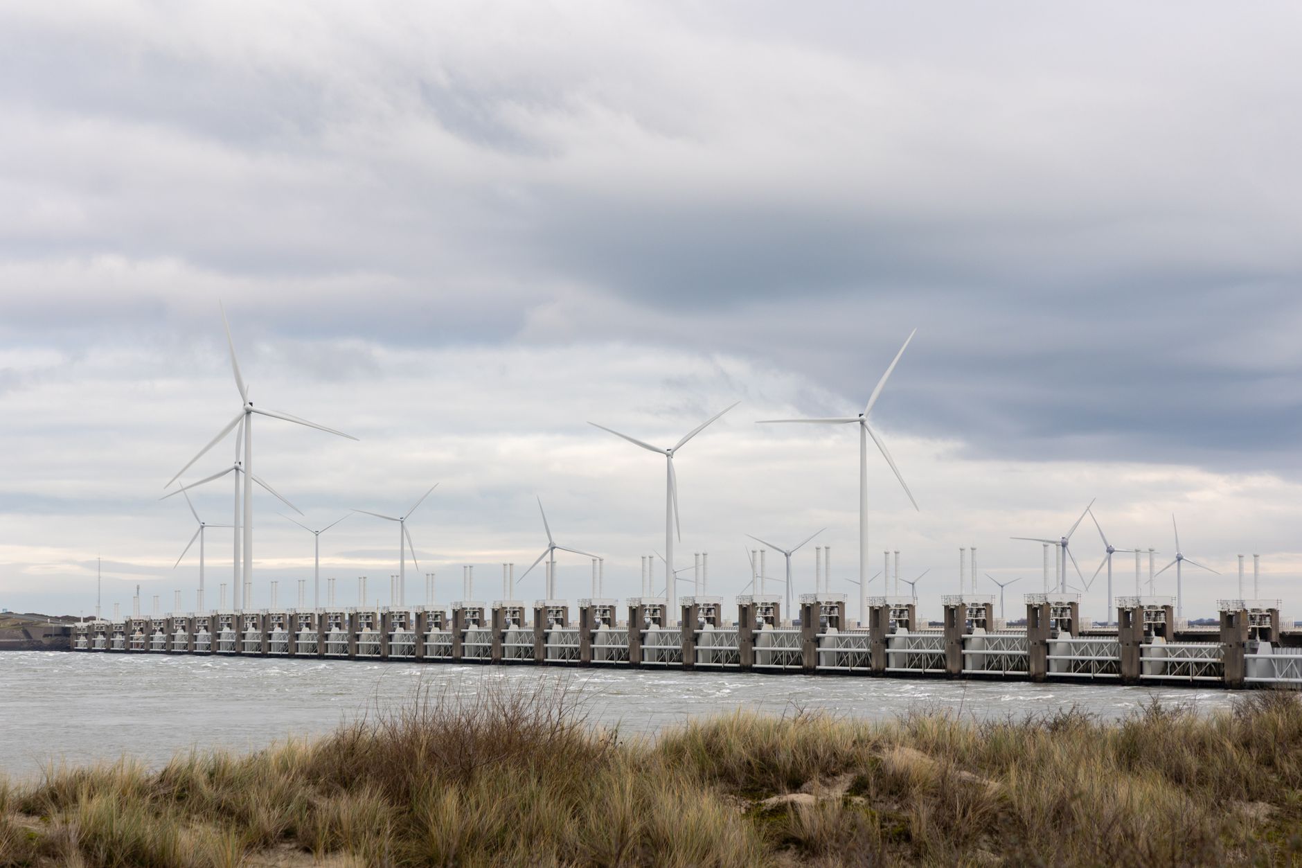 Panoramic view of wind turbines at Oosterscheldekering dam in Zeeland, Netherlands.