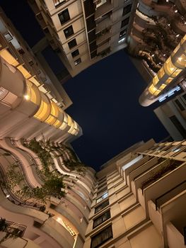 Captivating night view of modern high-rise buildings in Dhaka, Bangladesh.