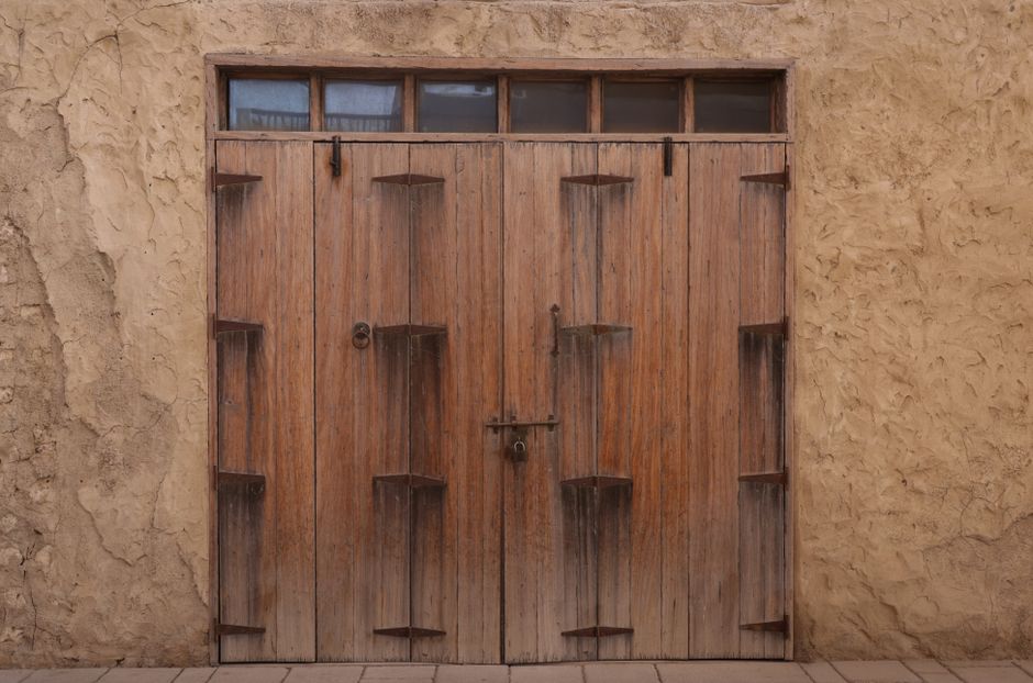 old wooden door forest path symbolic