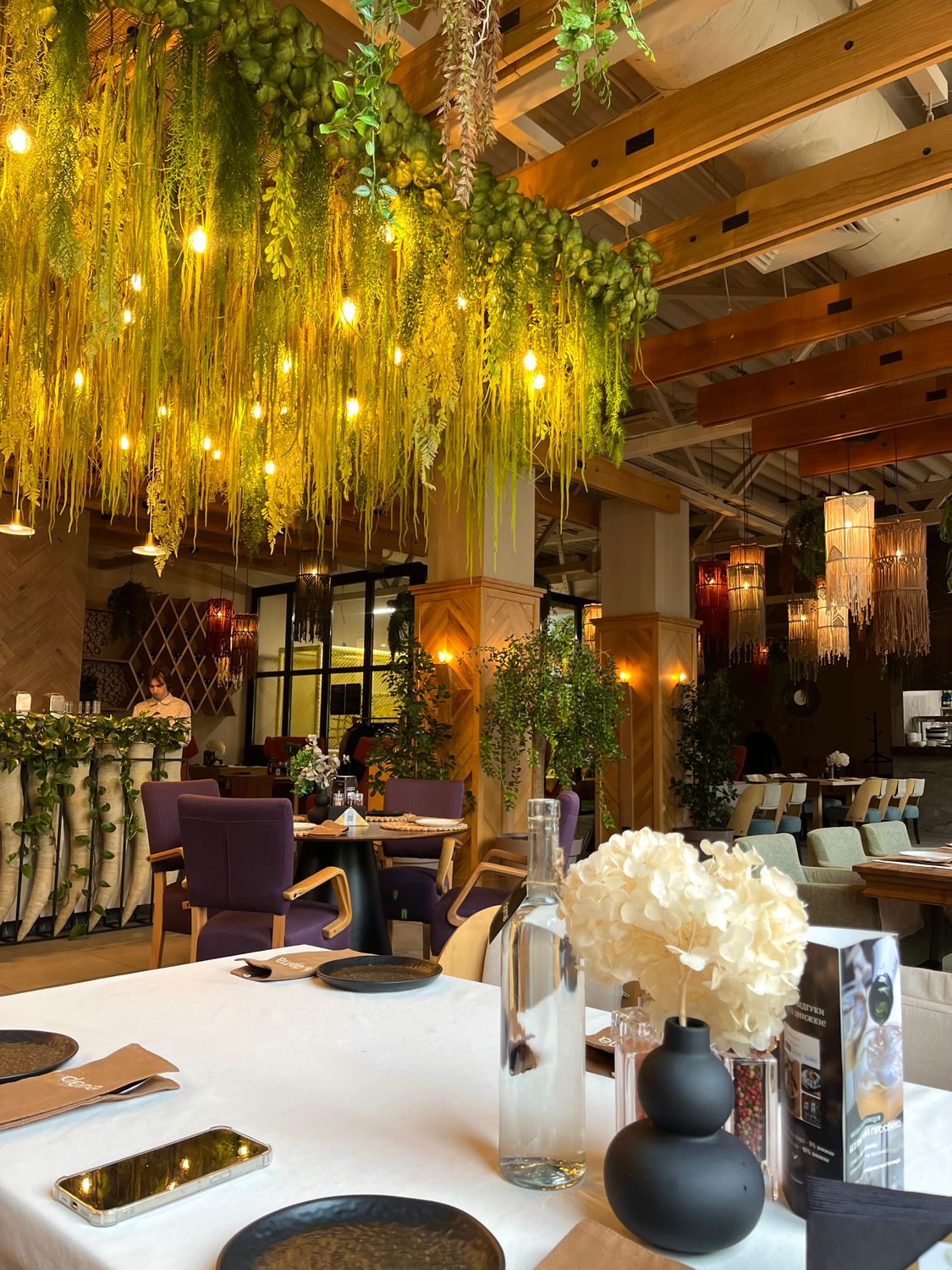 Elegant Restaurant Interior with Botanical Decor · Free Stock Photo