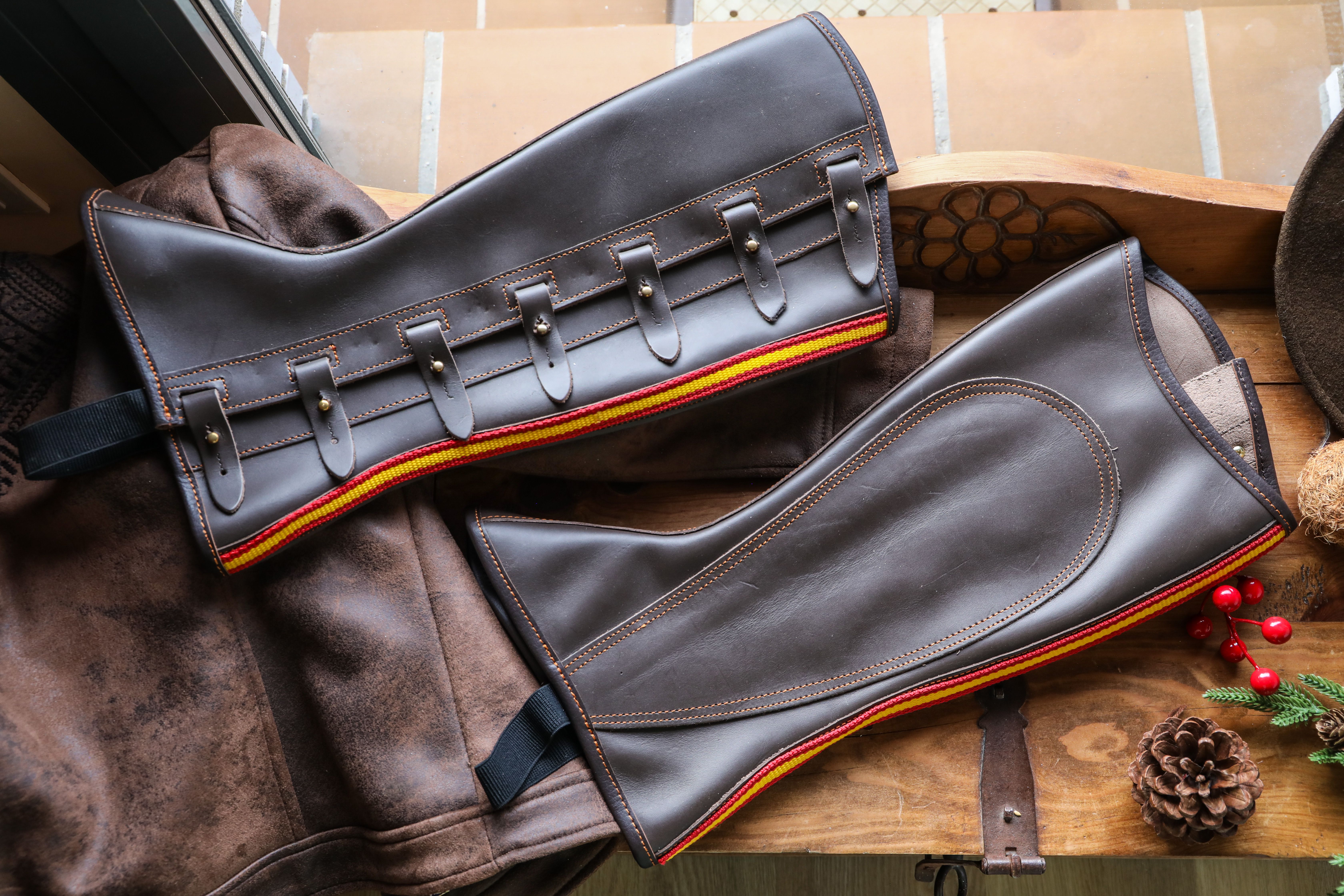 Brown Leather Riding Chaps with Decorative Trim · Free Stock Photo