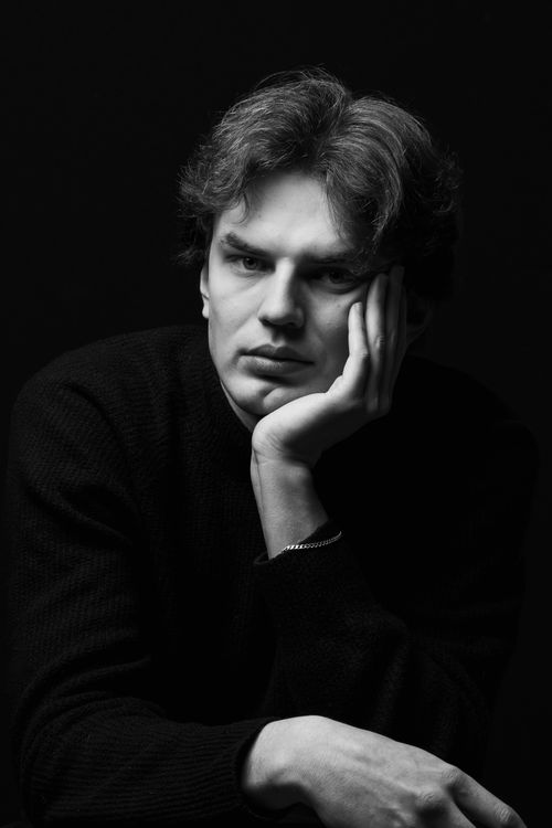 Free Striking black and white portrait of a man with a contemplative expression. Stock Photo
