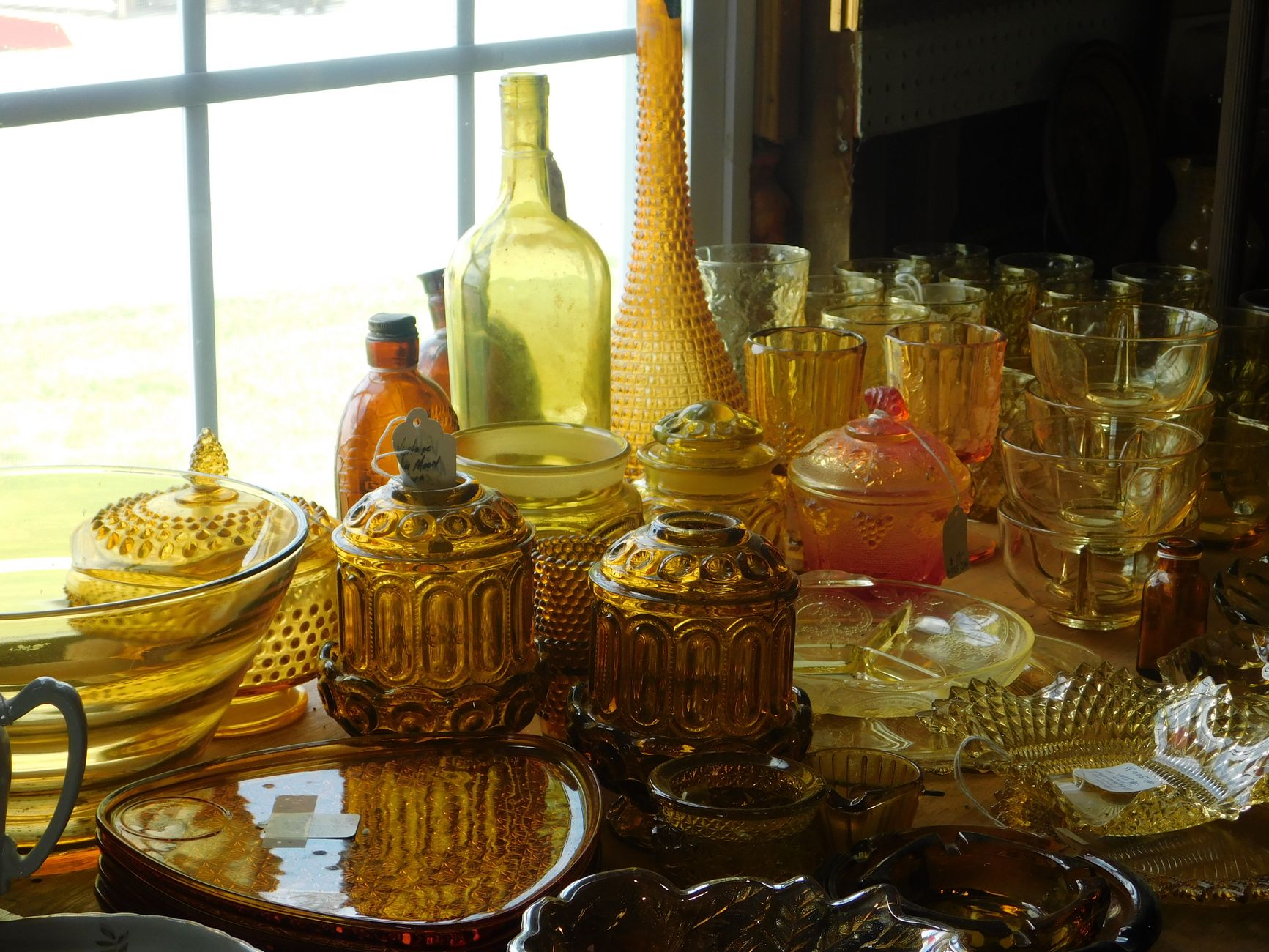 Vintage coupe and Nick and Nora glassware on table