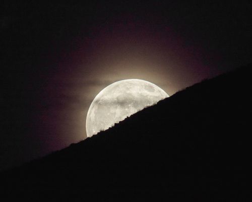 Free Full Moon Rising Behind the Mountains Stock Photo