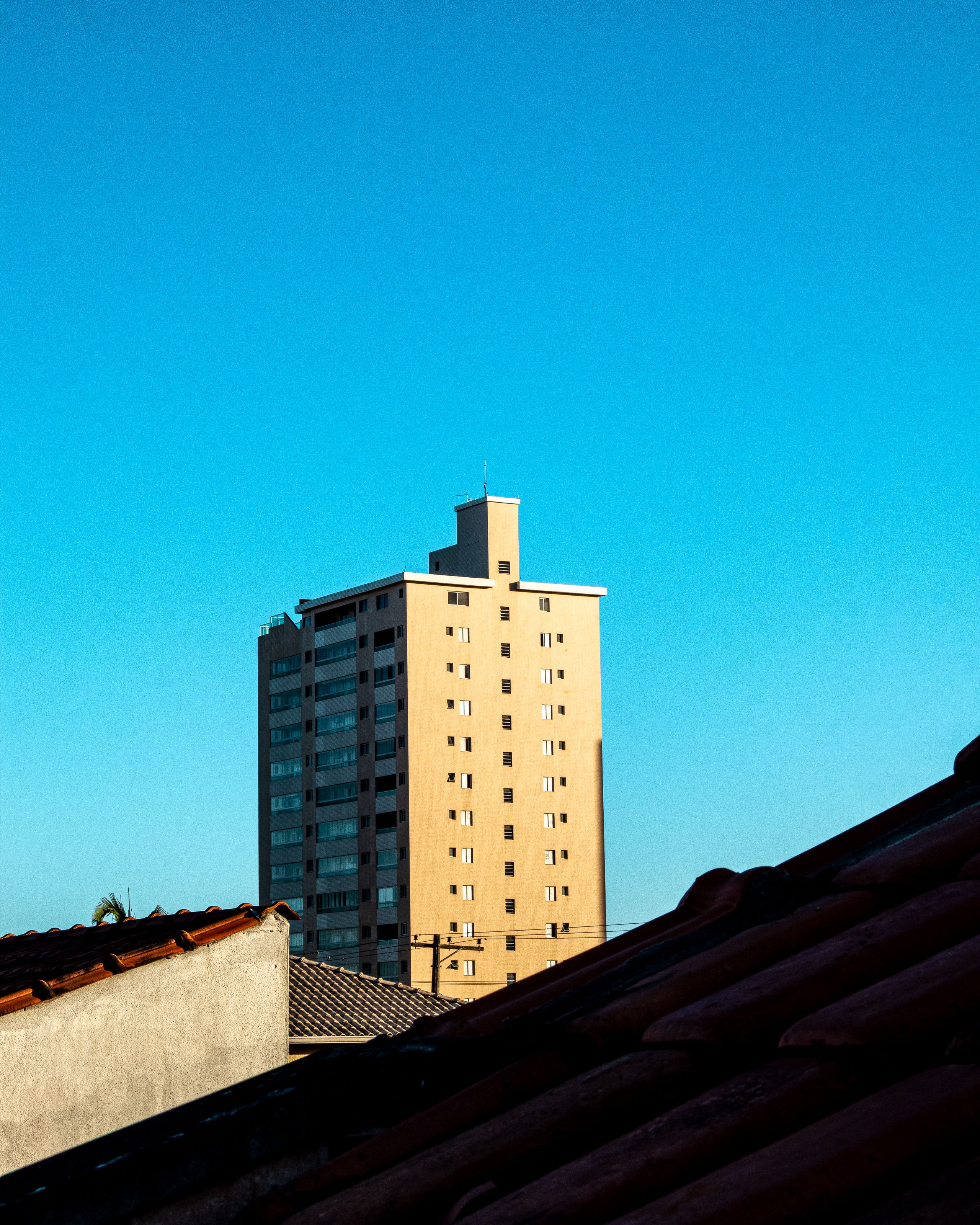Person reviewing rental documents and property listings