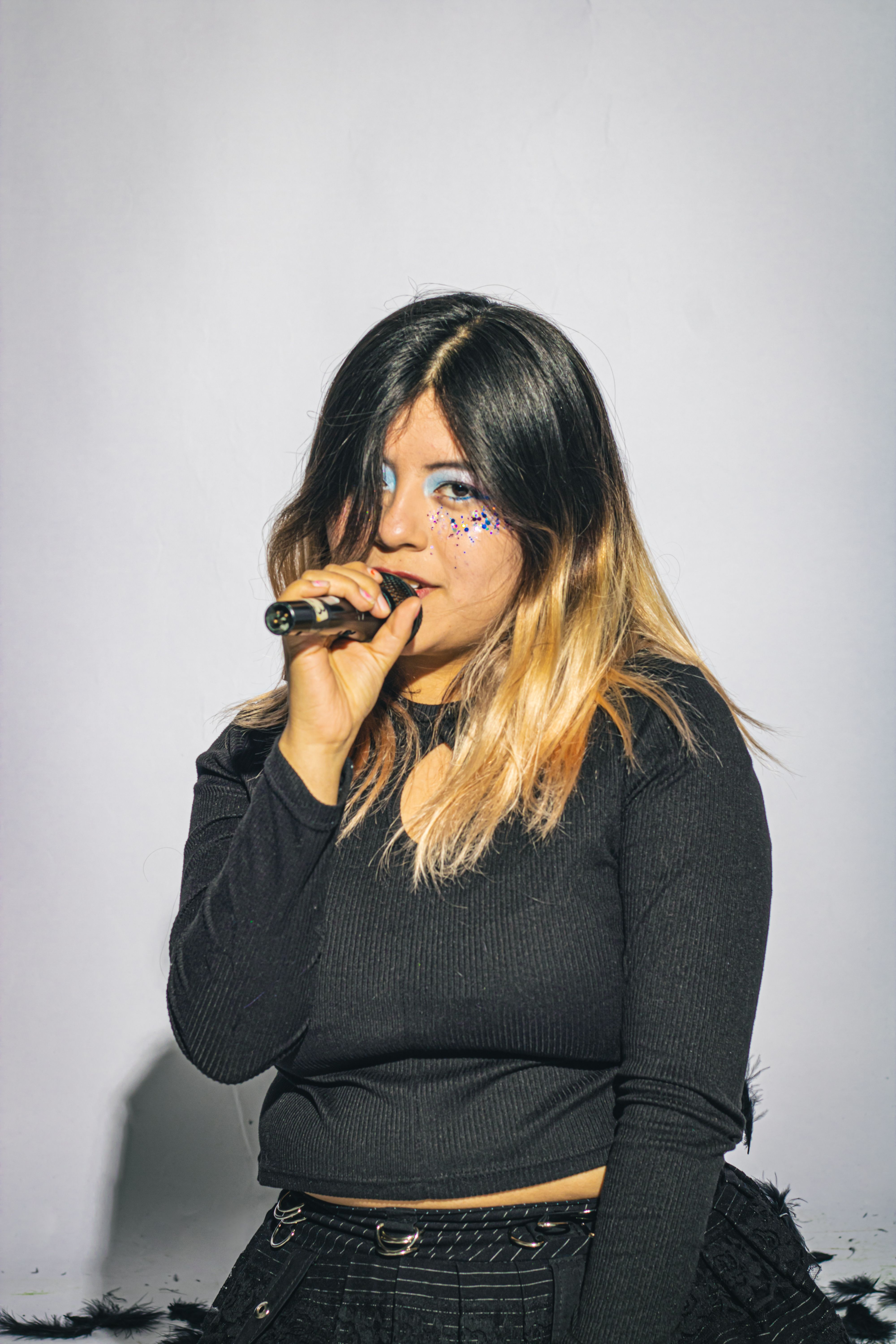 Artistic Portrait of Singer with Bold Makeup · Free Stock Photo