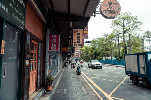 A vibrant street scene in Shilin District, Taipei, capturing daily urban life.