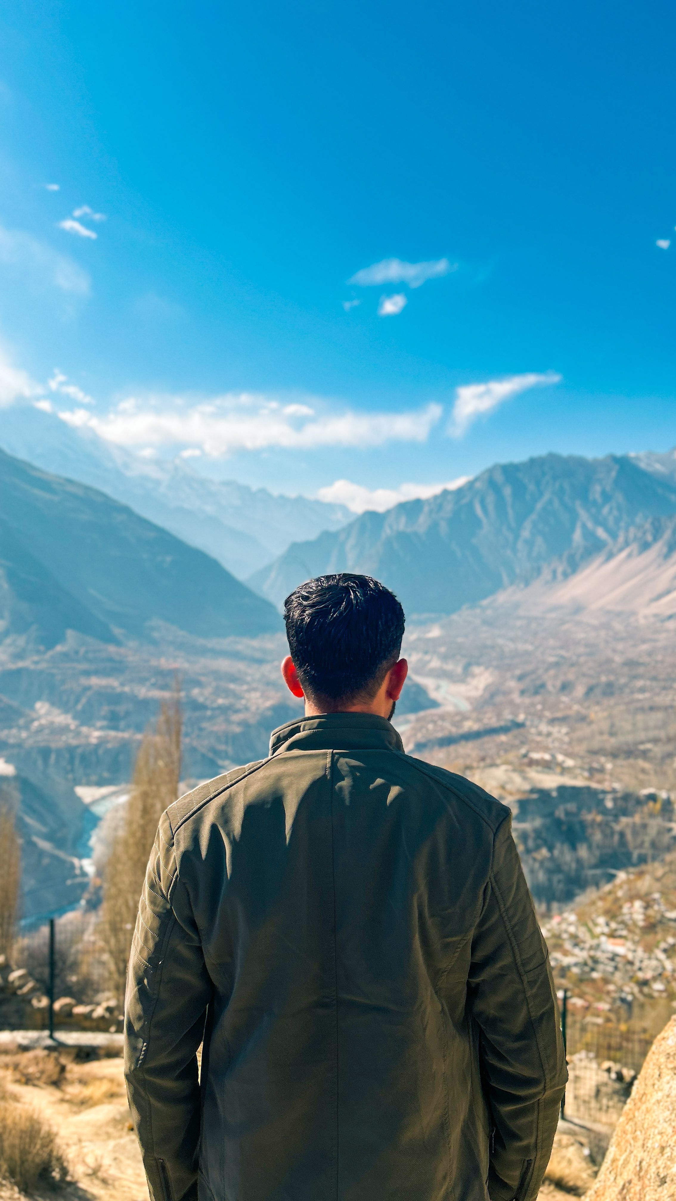 Man Admiring Hunza Valley Mountainscape · Free Stock Photo