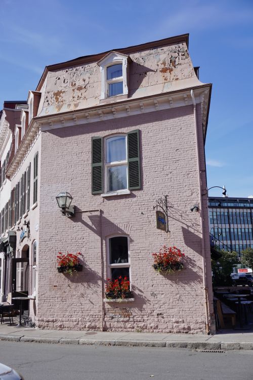 Pink Building Collapsed Charming Historic Pink Brick Building on Sunny Day · Free Stock Photo