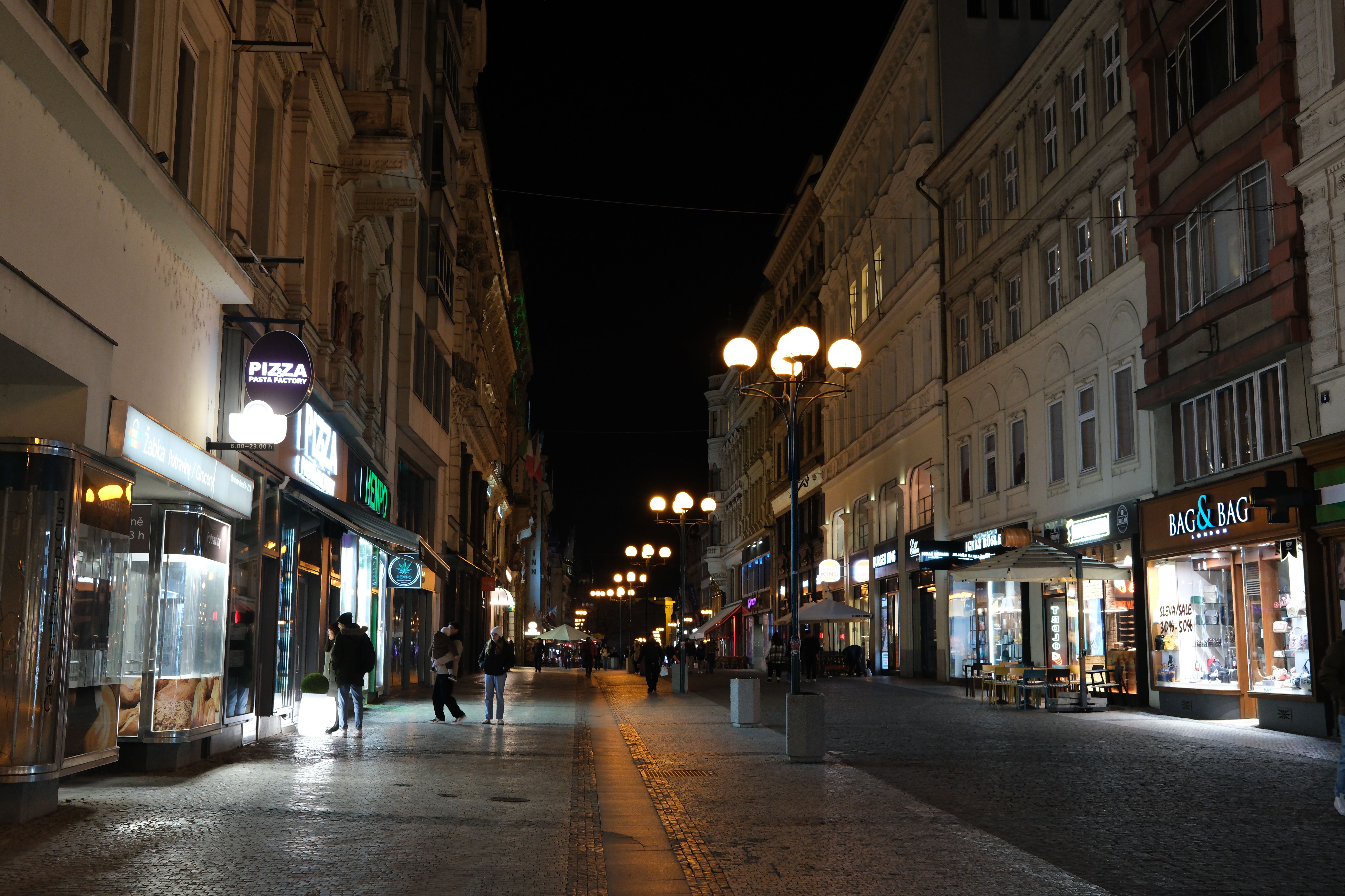 Night view of Prague's illuminated city street · Free Stock Photo