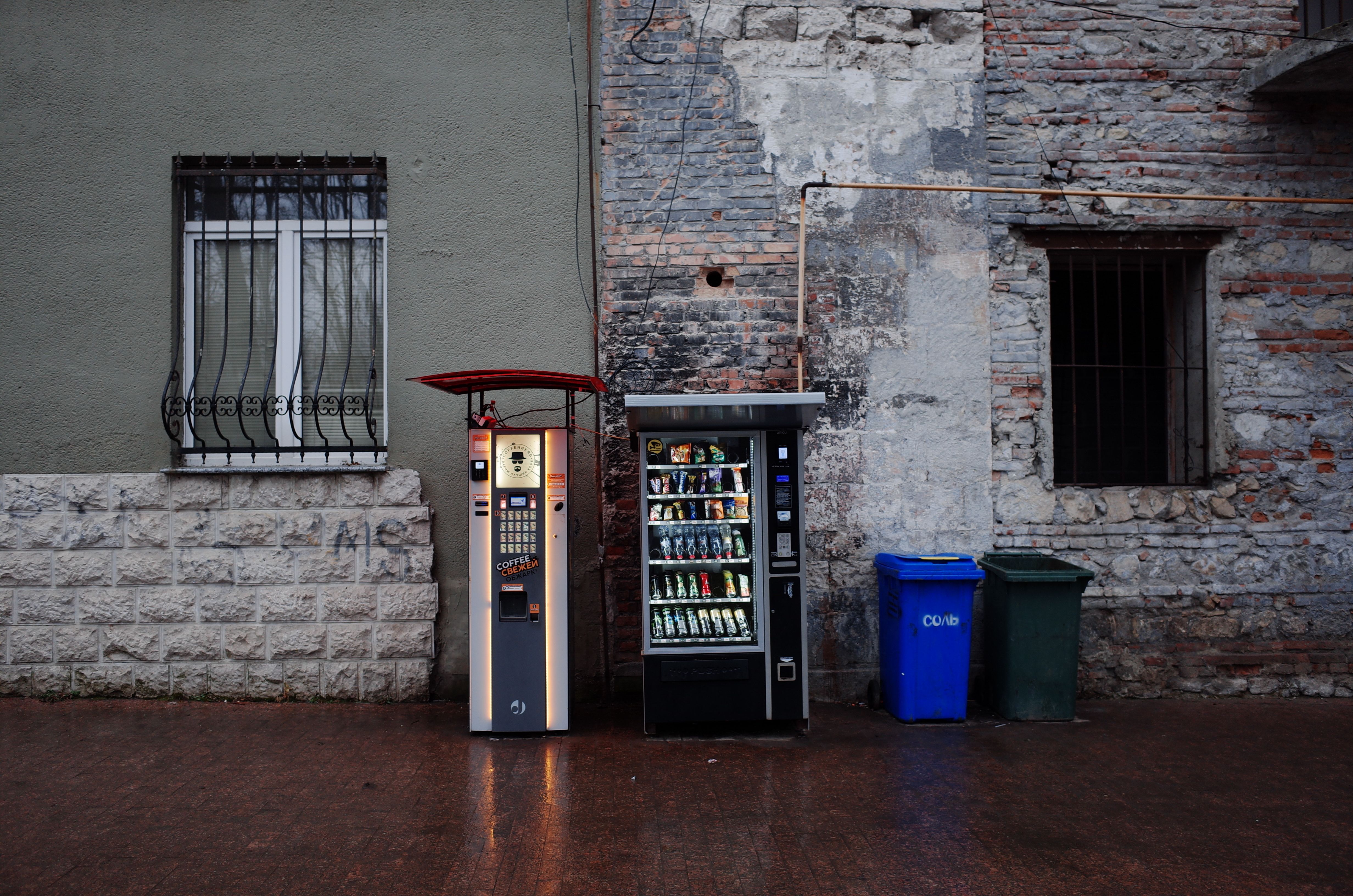 Urban Street with Vending Machines and Bins · Free Stock Photo