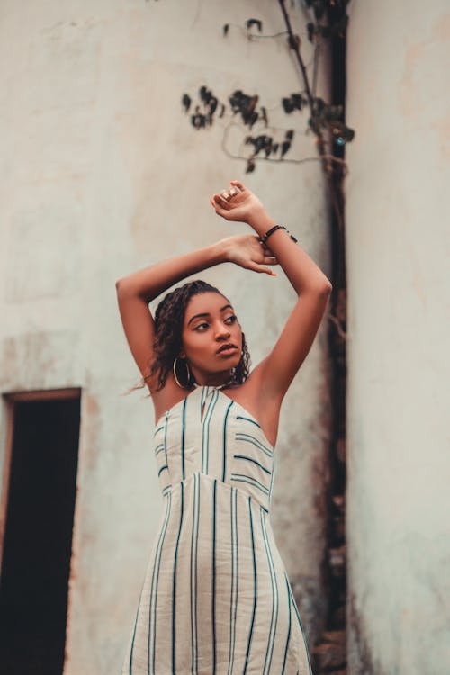 Photo Of Woman Wearing Striped Dress