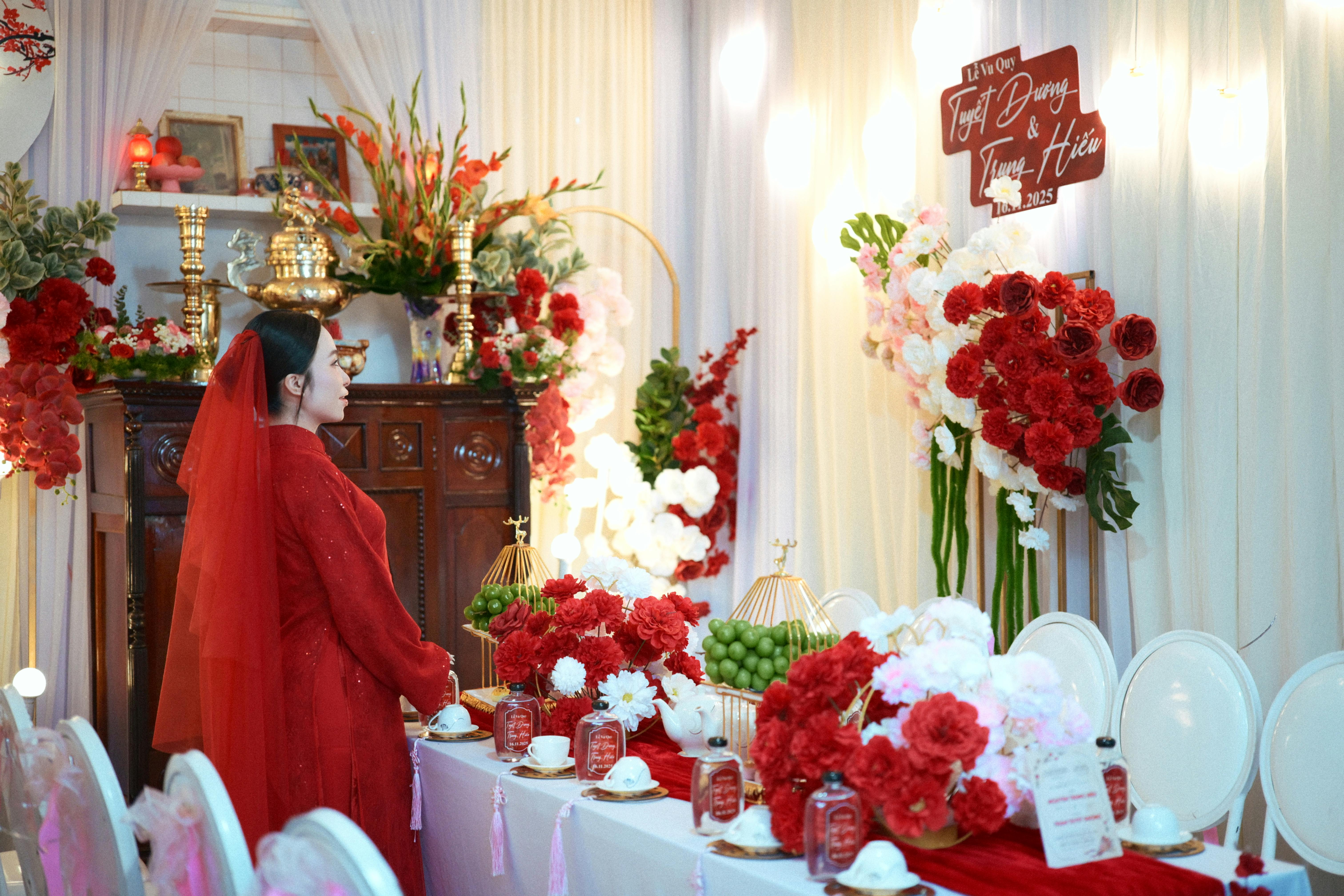 Traditional Vietnamese wedding setup with vibrant floral arrangements.