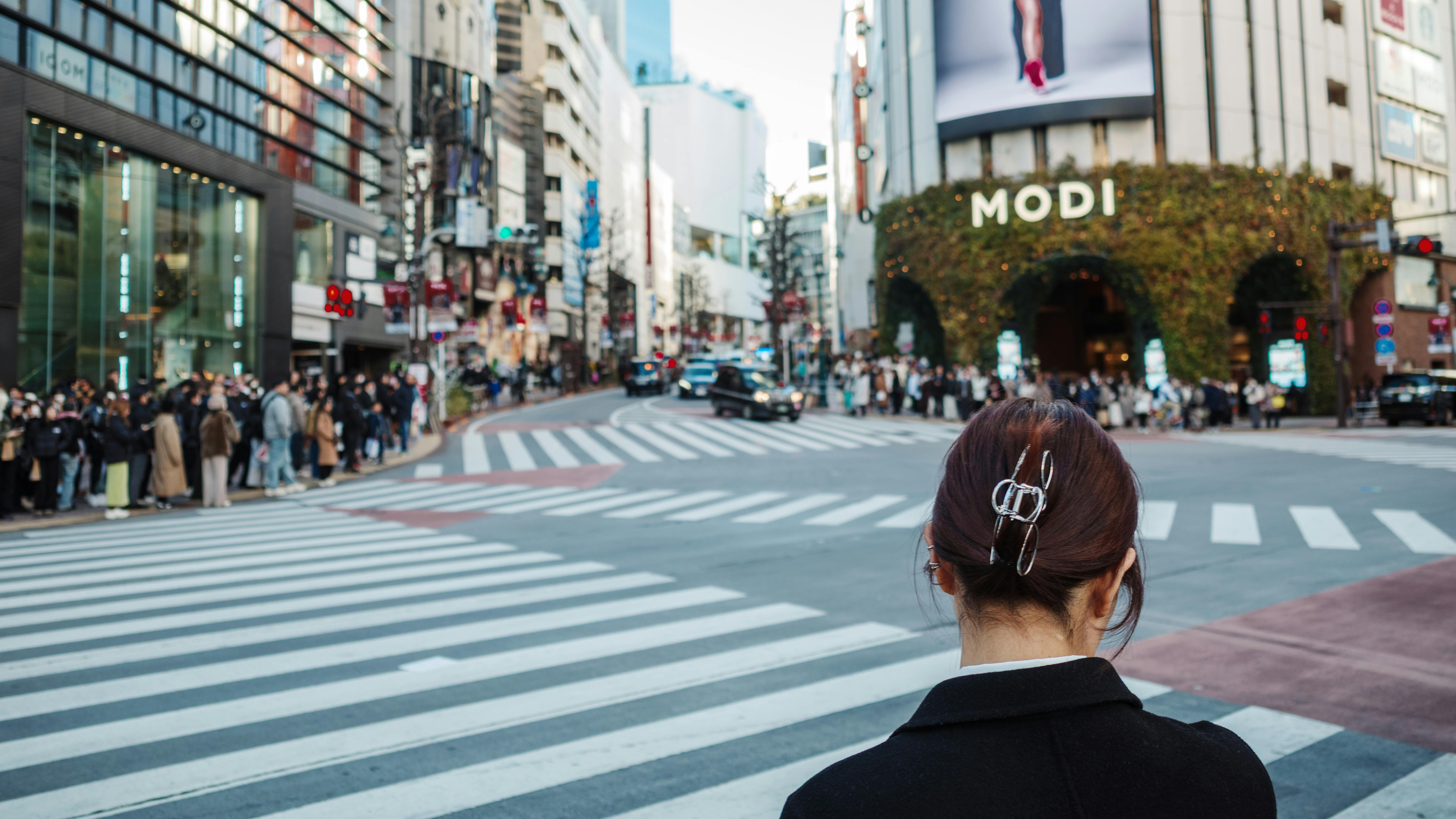 Free A bustling day at Shibuya crosswalk, Tokyo, with vibrant urban life and crowds. Stock Photo