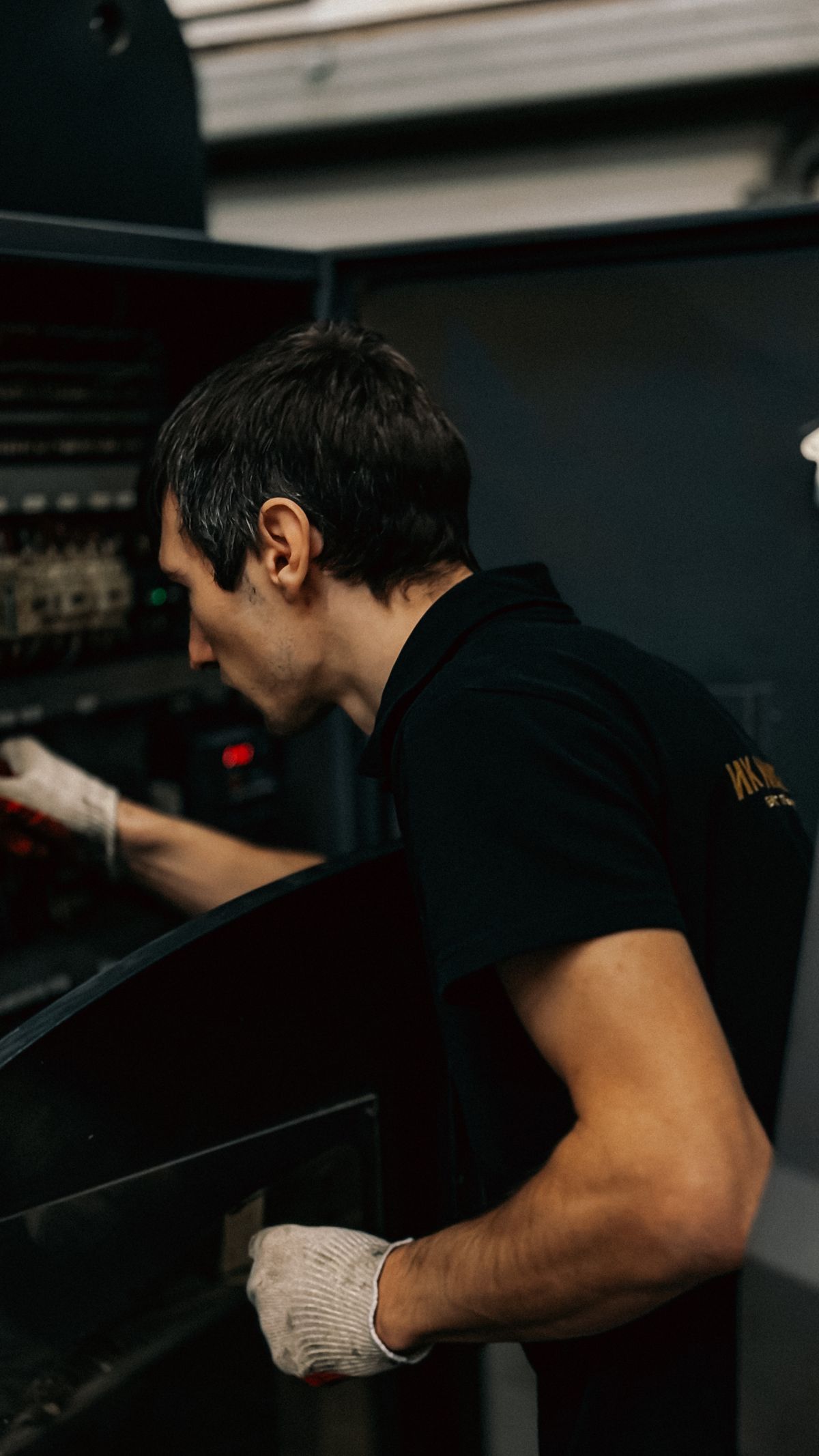 Technician inspecting industrial equipment