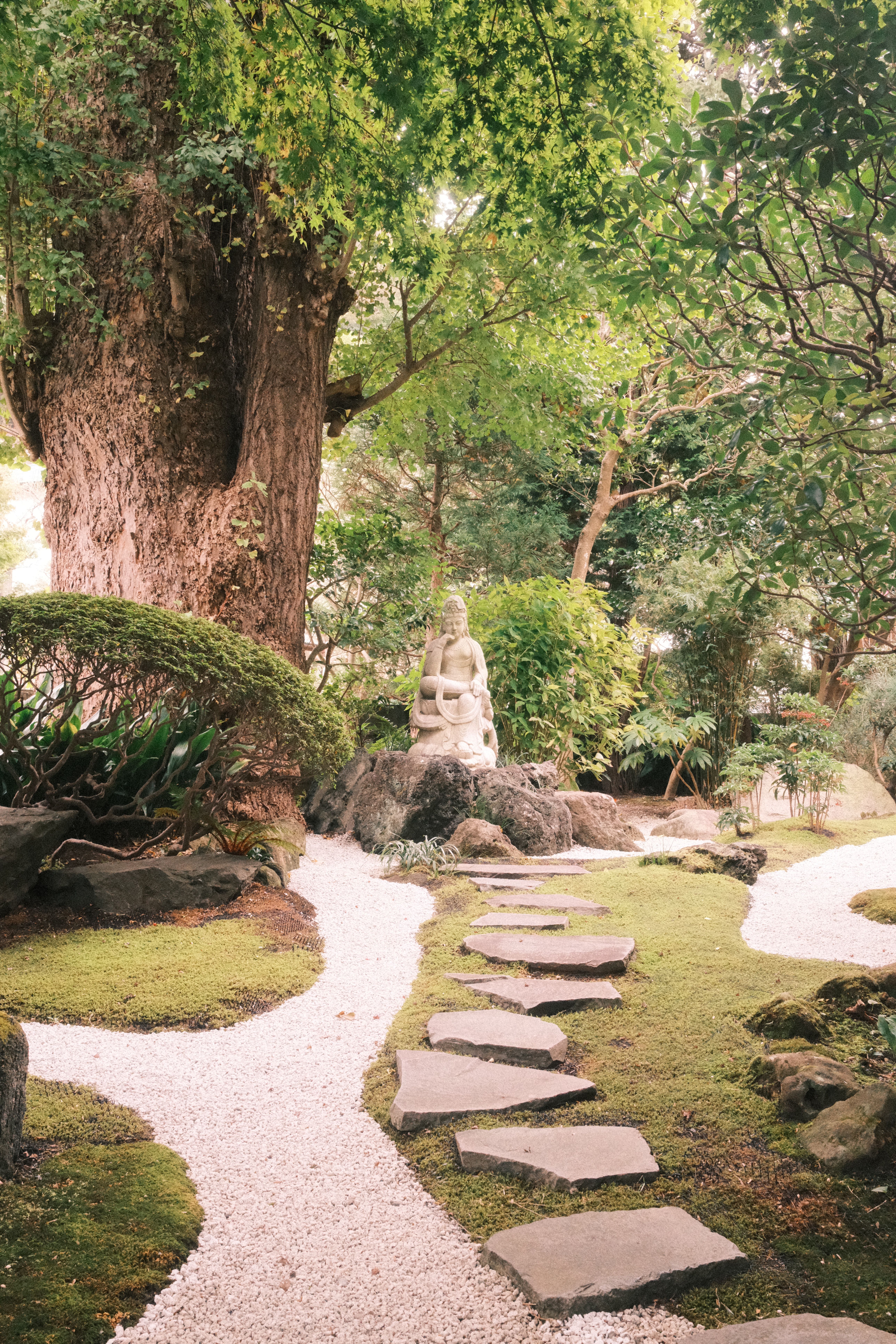 Tranquil Zen Garden Path with Stone Statue · Free Stock Photo