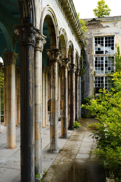 Free Explore the stunning decayed colonnade architecture amidst lush greenery in Tskaltubo, Georgia. Stock Photo